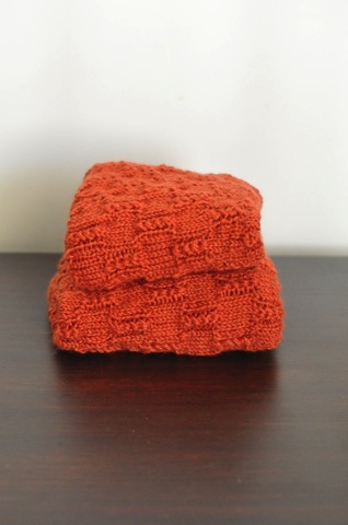 Pile of orange knitting.jpg